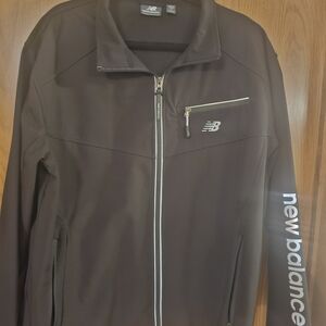 New Balance Men's Black Windbreaker with Silver Accents